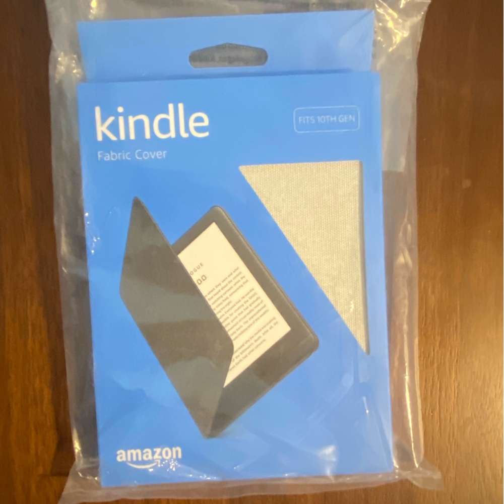 New in box. Tan fabric kindle 10th gen cover